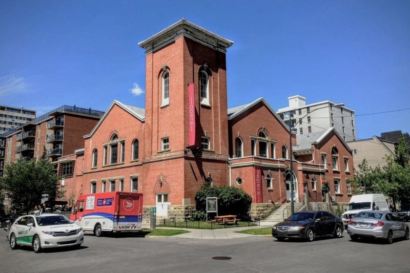 Modern day image of brick building with tower