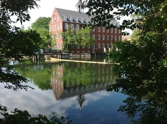 The mill with the Winnipesaukee River in the foreground.