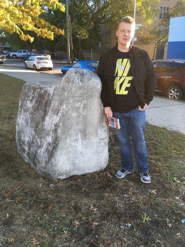 Rock present at the traffic circle on the West side of the park. The rock is bare, but it may serve memorial purposes.