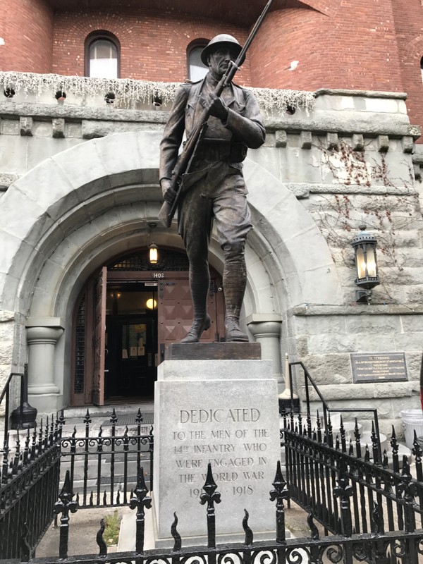 Front of Statue, outside of Park Slope Armory, YMCA. Bronze depiction a World War I Infantry soldier or Doughboy- on 8th Avenue side of building, intersection between 8th Avenue and 15th StreetPhotographer: 