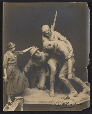 The designer of the sculpture, Gertrude Vanderbilt Whitney, standing with the casting in early 1922.