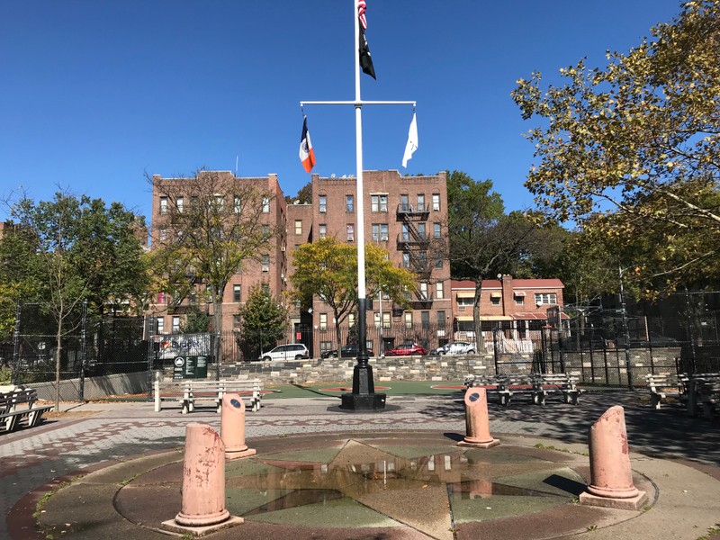 Central flagpole at Zimmerman Park. Includes POWMIA flag.