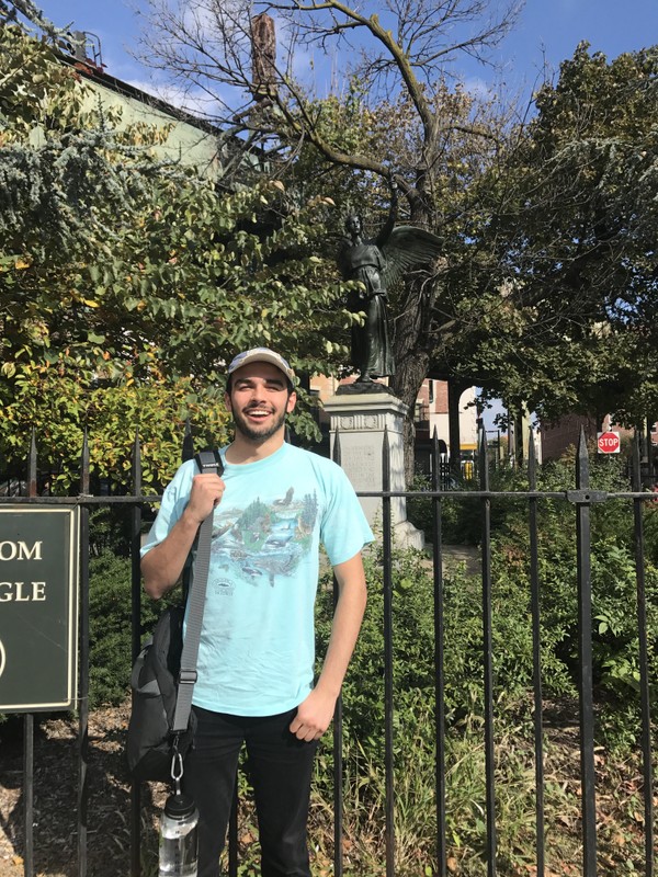 The author with the statue for size comparison.