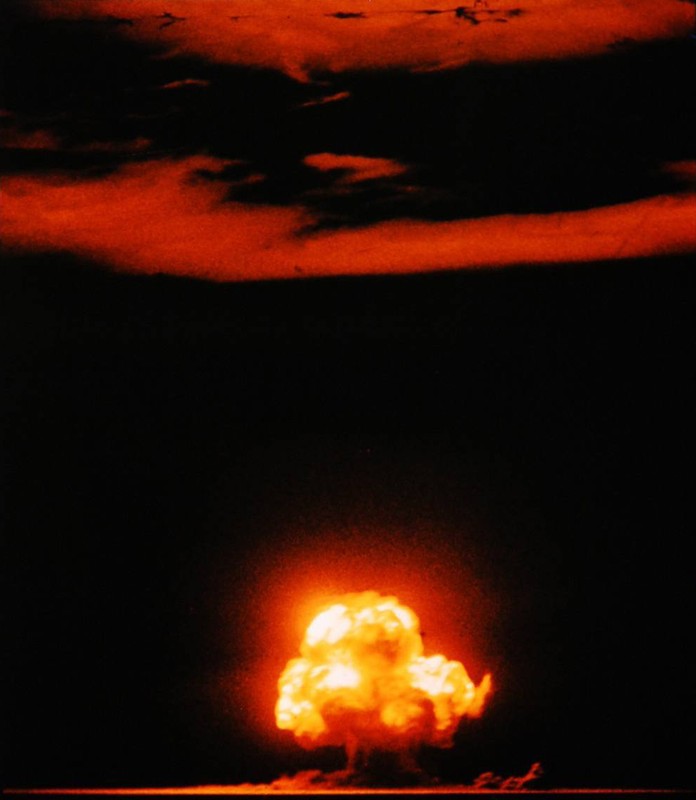 This is the only known photograph of the explosion in color. Following this explosion, the world entered the uncharted waters of the nuclear age. (Courtesy of Jack W. Aeby)