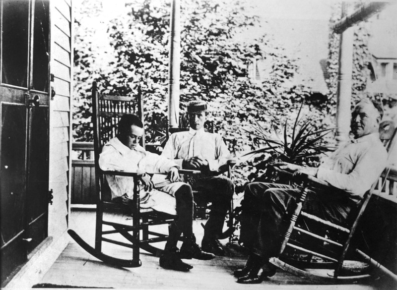 The O'Neill men, James, Jamie and a young Eugene, on the porch of the Monte Cristo Cottage.