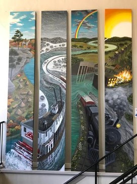 A mural painted by local artist, Adrian Columb, brings the history of Calico Rock to life inside the Tomlinson Art & Science Center.