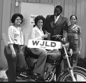 Tall Paul with fans and Harley prize (1980)