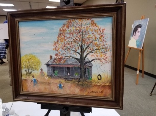 Painting of large tree with tire swing towering over small house, family in yard