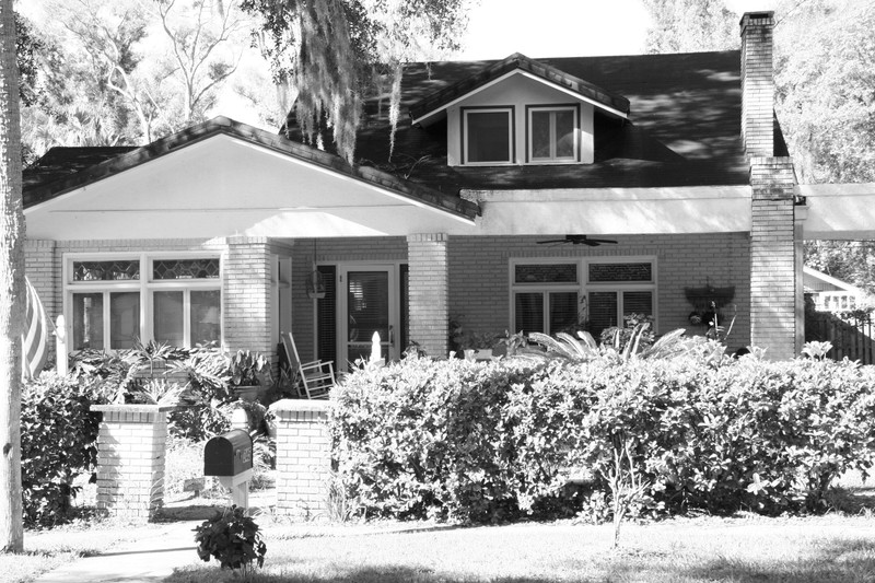 Front of home before historic windows were removed.