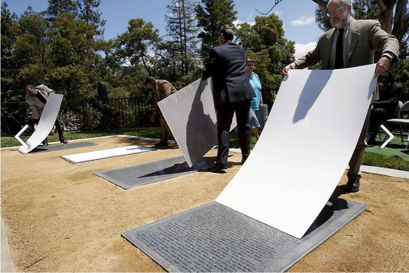 The four plaques being unveiled at the dedication service on May 30, 2011.
