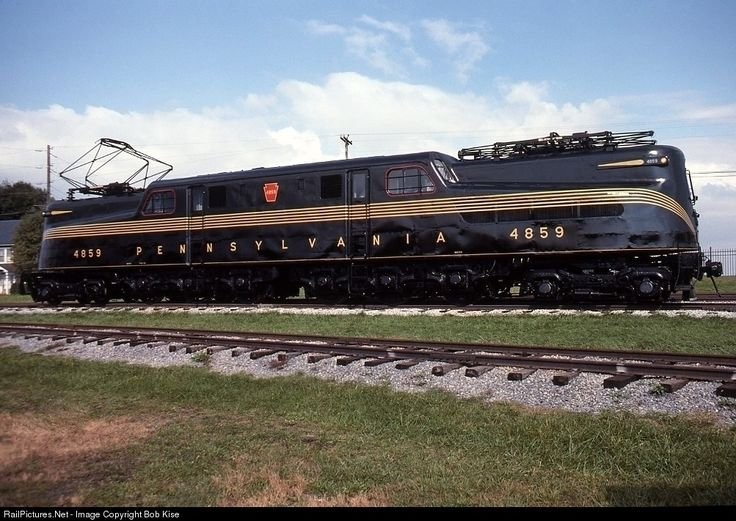 #4859 with its two pantographs extended which slide along the electrified overhead catenary wires.  