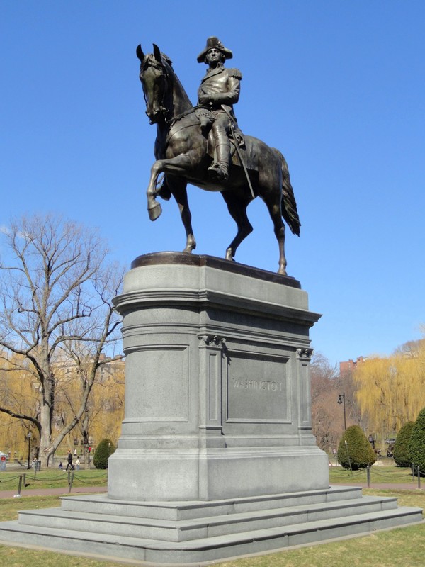 The Equestrian Statue of George Washington is located in the Boston Public Garden, America's first public botanical garden. 