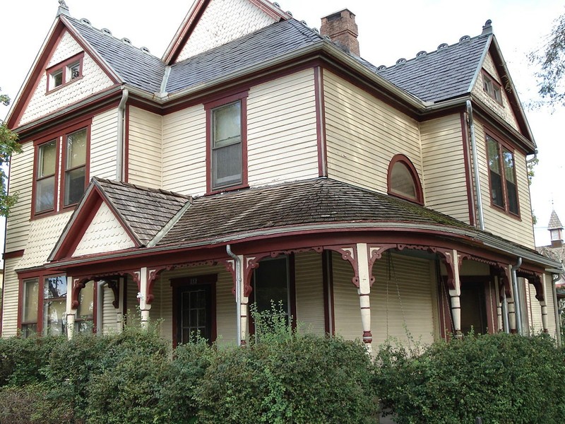 This asymmetrical house is built in the Queen Anne style.