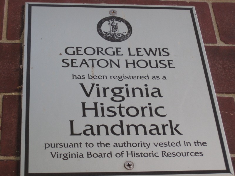 Plaque found on the property, commemorating the late George L. Seaton.