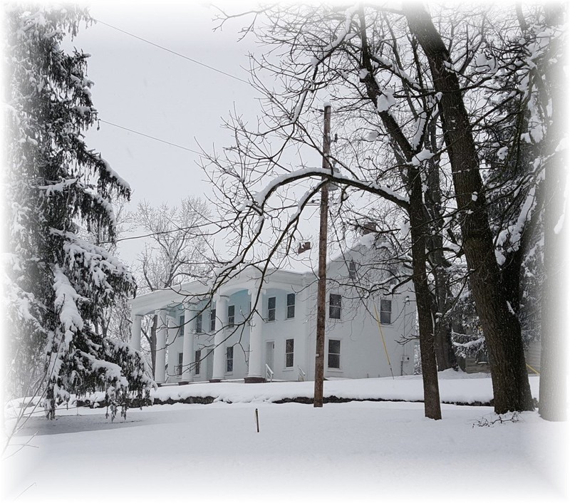 The plantation's mansion and grounds under a blanket of snow.