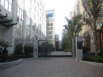 Alley gate that contains the Vernon Alley marker.