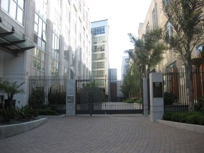 Alley gate that contains the Vernon Alley marker. 