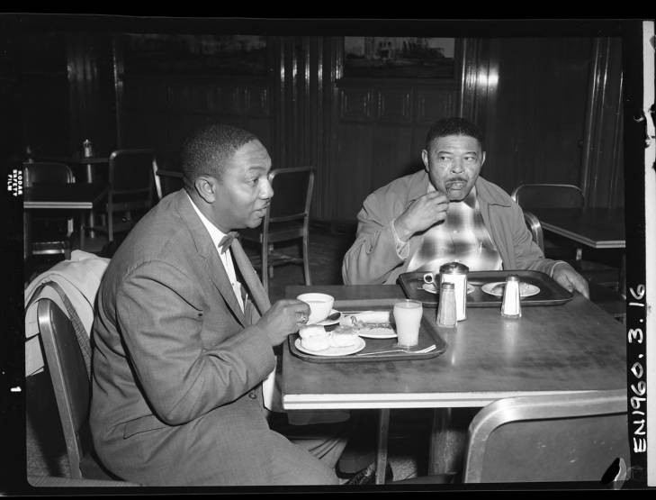 Two men eating lunch on the first day of desegregation at Woolworth's in San Antonio