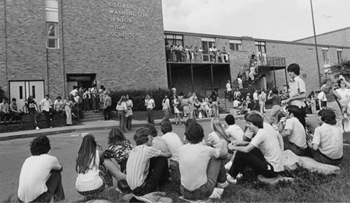 Some 1,200 students walk out of Charleston's George Washington High School to protest the board's decision to remove the textbooks.