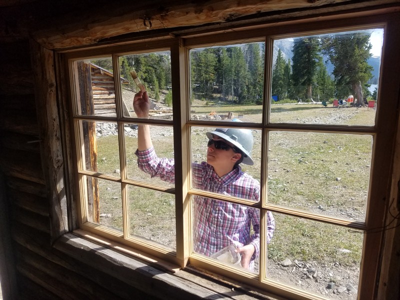 HistoriCorps crew and volunteers worked on repairing and replacing windows at Simpson Lake Lodge in summer 2017.