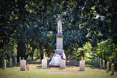 The monument to an unknown Confederate soldier located within Friendship Cemetery