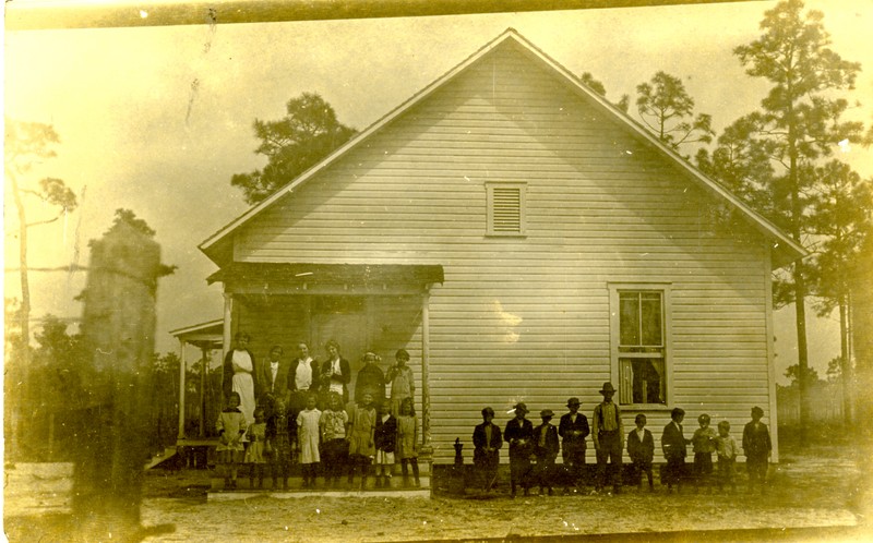 Teacher Rosa Kilgore and students in front of the Harris School, Lealman, Florida, circa 1916. 