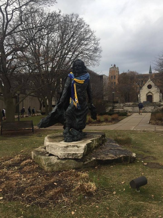 Father Marquette statue in its original location near the Joan of Arc Chapel. Photo: Brigid Nannenhorn 