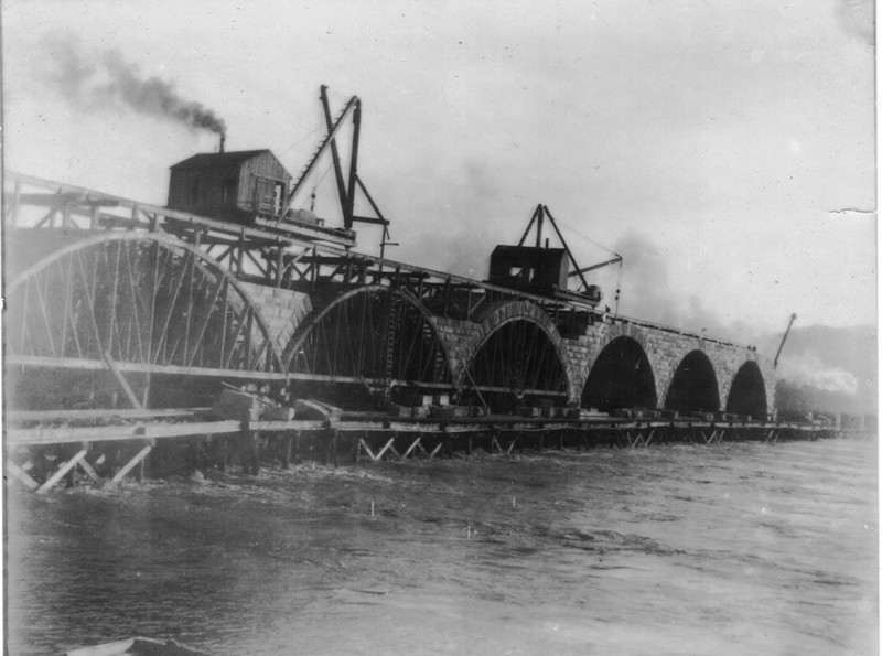 A view of the Rockville Bridge from the river during construction.