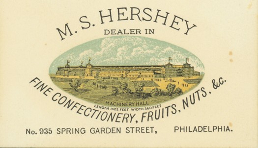 Milton Hershey's first business card featuring the Centennial Exposition's machinery hall. 