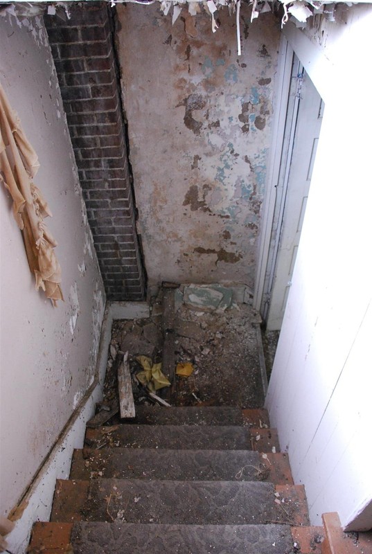 Rear Stair (Likely not original).  Note brick column in corner (Likely support for two story "sleeping porch" originally)