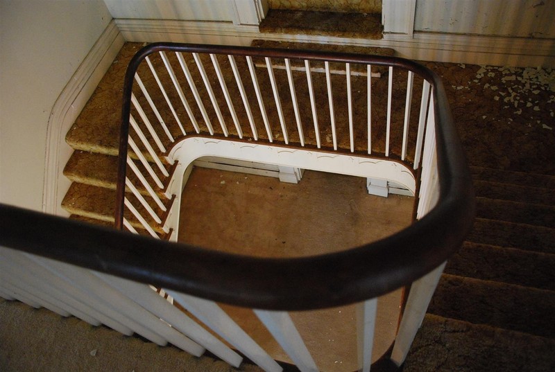 View of Grand Stair - including later addition of Doorway at Landing.