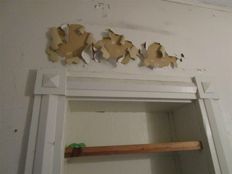 Example of Infilled Doorway with shelving (previously stepping out into sleeping porch)