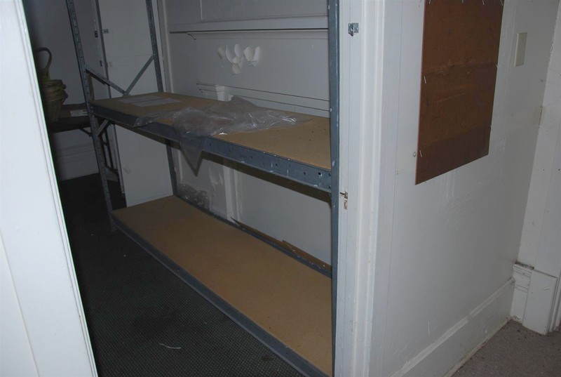 Example of Infilled Fireplace with added walls to create a storage room within the original Dining Room Space.