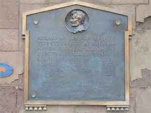 Plaque located outside of Mclevy Hall commemorating the visit from our President Abraham Lincoln. This plaque marks the site where Lincoln spoke.