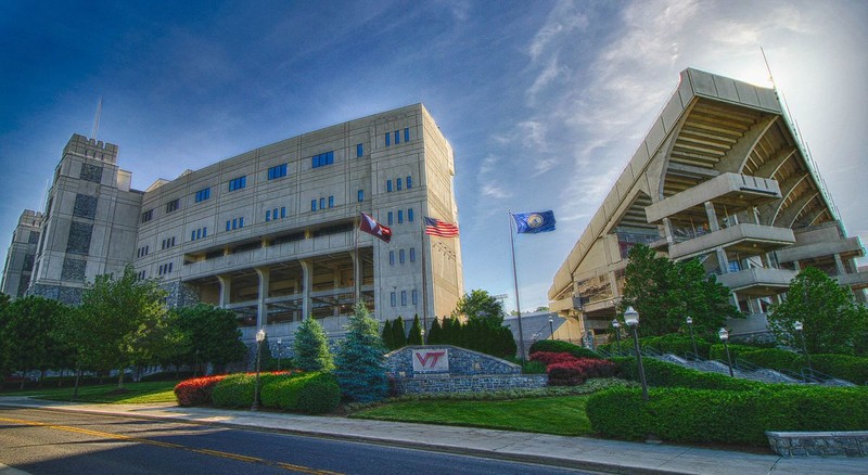 Graphic of Lane Stadium's southwest corner as seen from Beamer Way; image by Rick C - https://www.flickr.com/photos/hitman23vt/17297397623/, CC BY 2.0, https://commons.wikimedia.org/w/index.php?curid=44769464