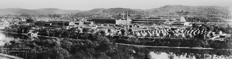 Panorama of the Naval Ordnance Plant (center). Armor Park, nestled between MacCorkle Avenue and the Kanawha River, is at right. Armor Park provided homes for 85 families.