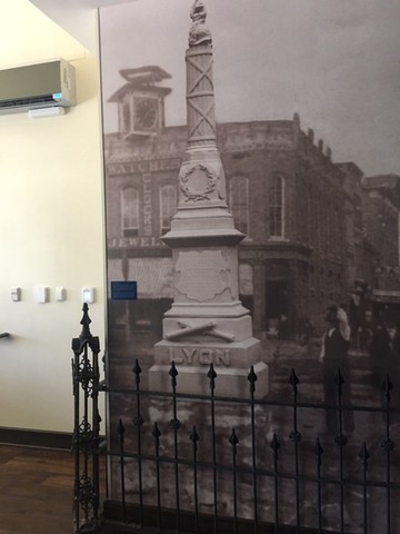 Photo of the Lyon Monument on the Square with the original Victorian fence