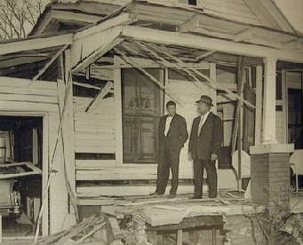 King on his porch after the initial blast and right before his speech to calm his neighbors from attacking the police officers.