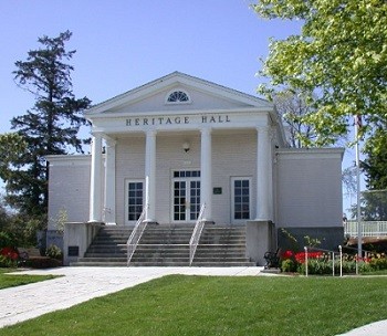 Here is modern day Heritage Hall. This building has been standing since 1922. It first served as a church, then became an office building until it was relocated and made into the town hall. 