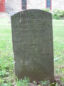 1863 gravestone of Cornelius Johnson, probably a slave, in the St. Mark's Episcopal Church cemetery
