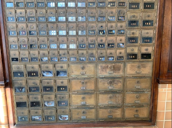 Mail boxes that were from the original Post Office built in 1938 during the New Deal.