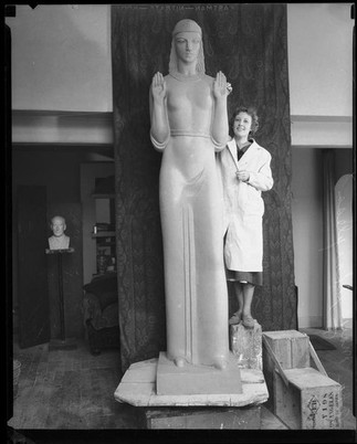 Ada May Sharpless standing proudly beside her 14 ft creation. Though she created other works of art through the P.W.A.P program, the Queen of Angels was her largest undertaking.