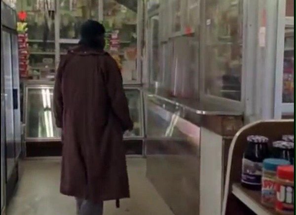 Character Omar Little, played by actor Michael K. Williams, on The Wire, walks into the once real life market, Novak's Food Market on the East Side of Baltimore