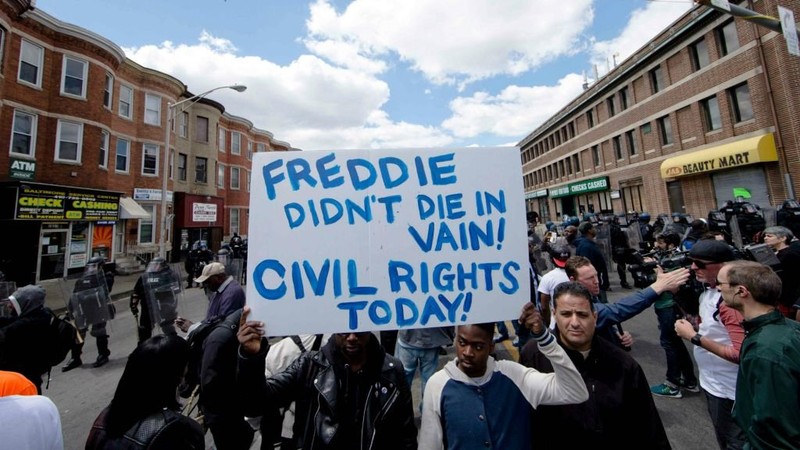 Peaceful protestors march for justice following the death of Freddie Gray 