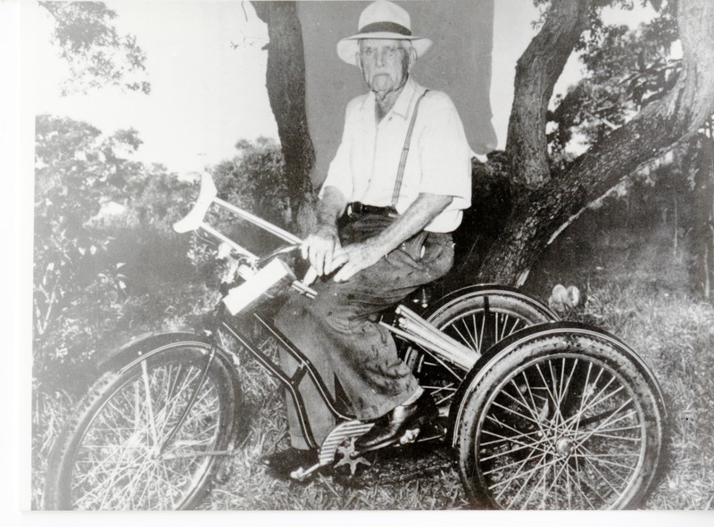 Jefferson T. Lowe on a bicycle, circa 1950. 