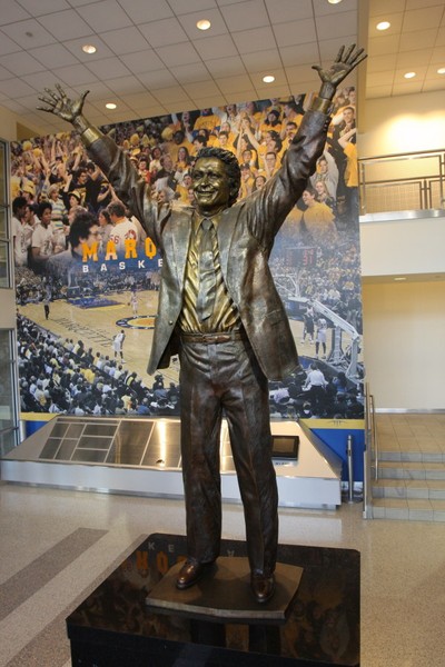 Statue of Al McGuire in the lobby of the Al McGuire Center. 

Photo:  Al McGuire Center: Official Photo Gallery, Gomarquette, http://www.gomarquette.com/view.gal?id=144181. 