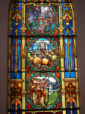 The building includes stained glass windows that tell the history of the fraternity. 