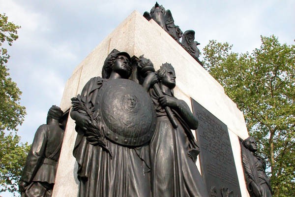 The memorial includes four statues of allegorical female figures including these two who represent the principles of war and peace.