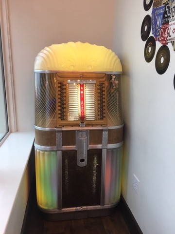 Play a song on this original Mother of All Plastic Jukebox! 