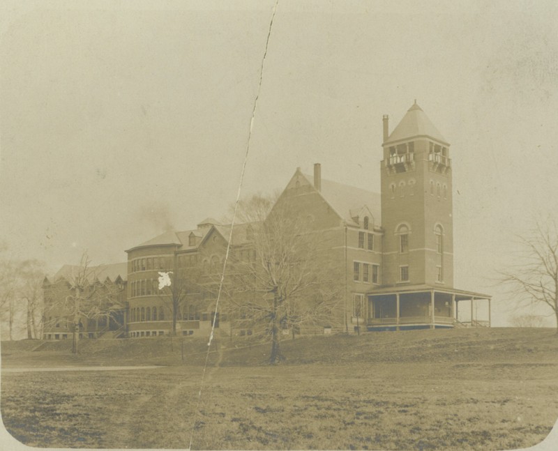 Old Main sometime between 1899 and 1905. Note the bell tower in front of the 1870 section.
